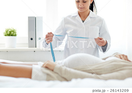 close up of doctor and pregnant woman at hospital 26143209