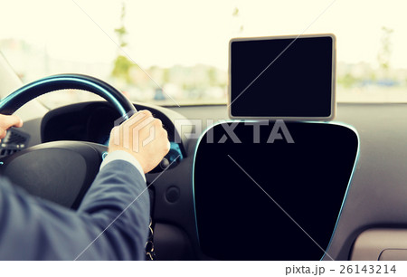 close up of businessman with tablet pc driving car 26143214
