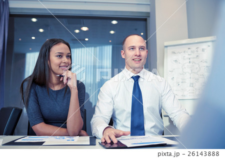 smiling business people meeting in office smiling business people meeting in office 26143888