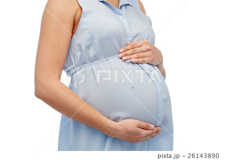 close up of pregnant woman touching her big belly close up of pregnant woman touching her big belly 26143890