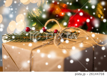 close up of christmas gift with fir brunch close up of christmas gift with fir brunch 26144708