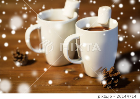 cups of hot chocolate with marshmallow on wood 26144714