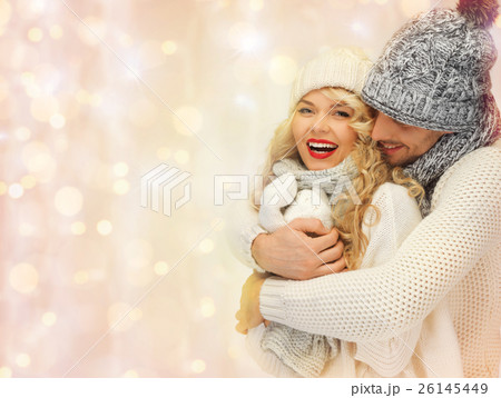 happy family couple in winter clothes hugging happy family couple in winter clothes hugging 26145449