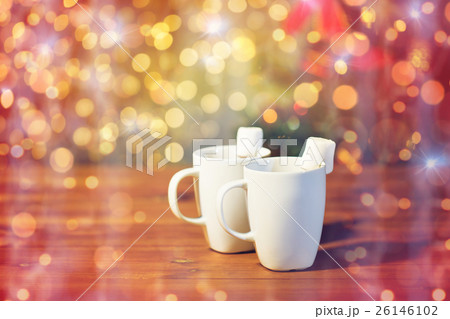 cups of hot chocolate with marshmallow on wood cups of hot chocolate with marshmallow on wood 26146102