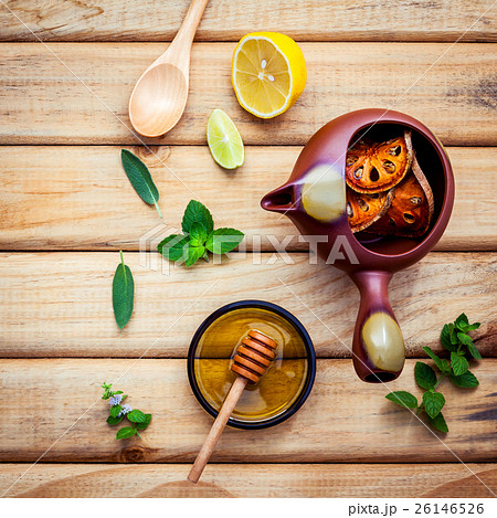 Herbal tea pot with fresh herbs . 26146526