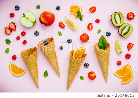 Cones and colorful various fruits raspberry . 26146615