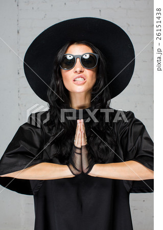 Model praying black clothes 26151438