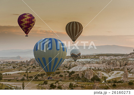 Hot air balloon flying over Cappadocia, Turkey Hot air balloon flying over Cappadocia, Turkey 26160273