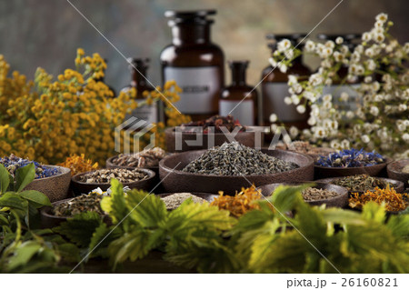 Herbal medicine on wooden desk background 26160821