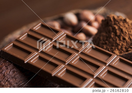 Cocoa pod and chocolate bar and food dessert  26162810