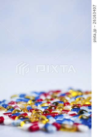 Closeup of medical capsule, healthy background 26163407