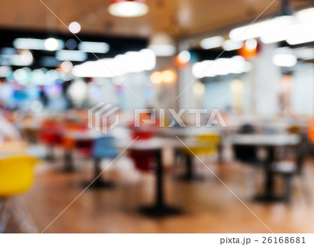 Blurred silhouettes of people sitting in a cafe. Blurred silhouettes of people sitting in a cafe. 26168681