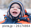 Attractive baby boy playing with the first snow 26174864