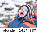 Attractive baby boy playing with the first snow 26174867