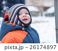 Attractive baby boy playing with the first snow 26174897
