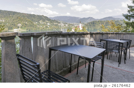 outdoor cafe tables with above view over lake Bled 26176462