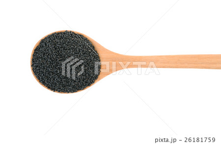 top view of black sesame seeds in wooden spoon  26181759
