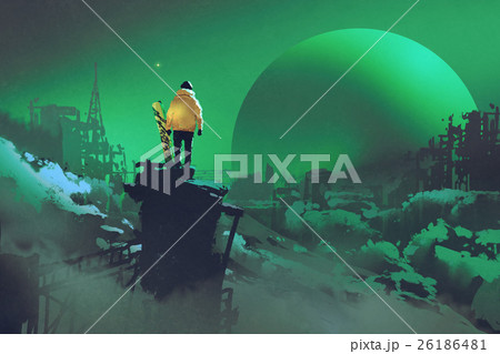 man standing against winter landscape 26186481