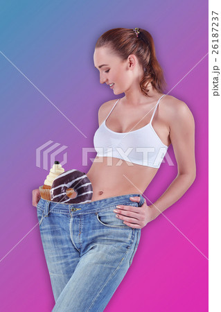 Woman became skinny and wearing old jeans Woman became skinny and wearing old jeans 26187237
