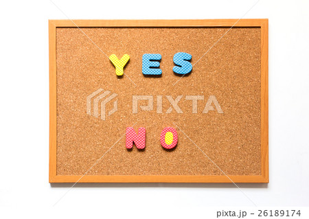 Brown cork board with wording yes no Brown cork board with wording yes no 26189174