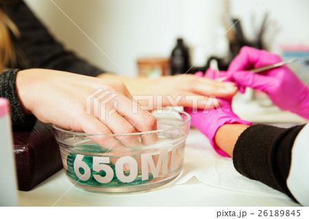 Manicure procedure with female hands. Manicure procedure with female hands. 26189845