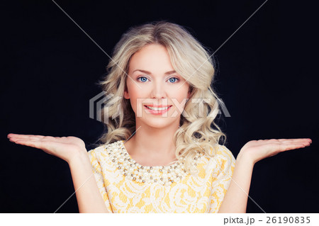 Friendly Woman smiling and showing her hands 26190835