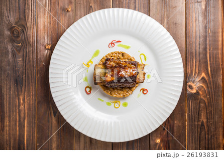 beef ribs on a bed of oatmeal beef ribs on a bed of oatmeal 26193831