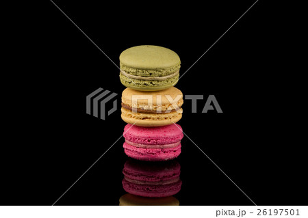Colorful macaroon over black background 26197501