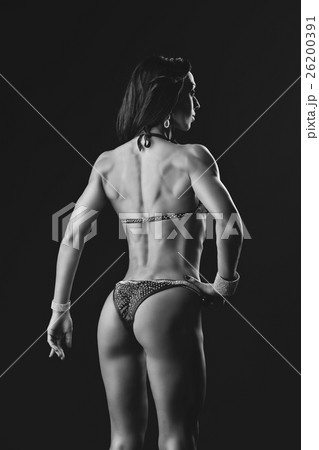 Bikini fitness girl in red swimsuit 26200391