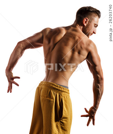 Bodybuilder Posing. Muscles of the back and arms. 26203740