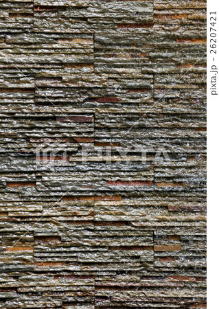 old stone wall Texture in weathered and have natural surfaces. old stone wall Texture in weathered and have natural surfaces. 26207421