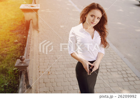 business woman enjoys gadgets 26209992
