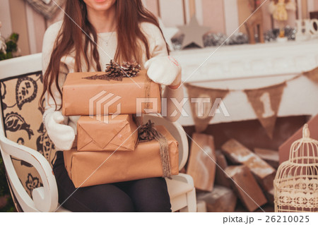 Girl with gift boxes Girl with gift boxes 26210025