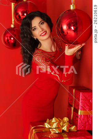 Fashion woman with christmas red xmas balls Fashion woman with christmas red xmas balls 26210619