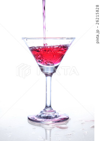 Red wine splash and flying out of the glass 26215828