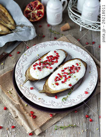 Roasted eggplants with yogurt sauce. Roasted eggplants with yogurt sauce. 26218011