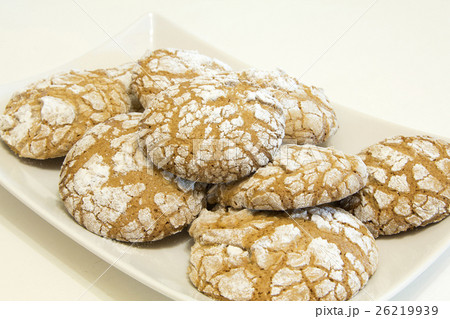 Chocolate cookies on a white plate 26219939