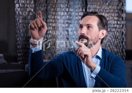 Nice bearded man touching the virtual screen 26222354