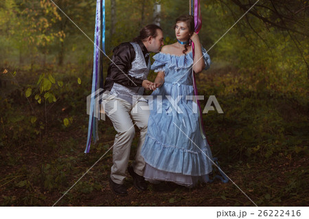 Man kissing woman's shoulder. Man kissing woman's shoulder. 26222416