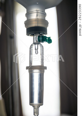 Close up IV saline solution drip for patient 26223390