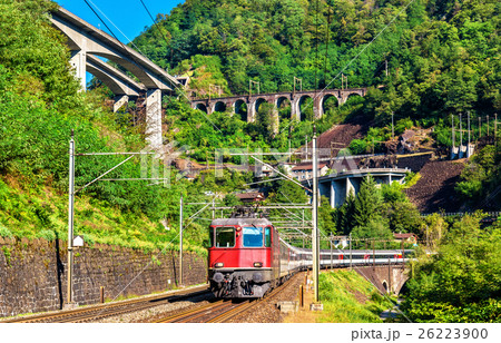 Passenger train is going down the Gotthard pass - Passenger train is going down the Gotthard pass - 26223900