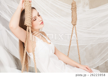 view of nice young lady swinging in studio view of nice young lady swinging in studio 26223958