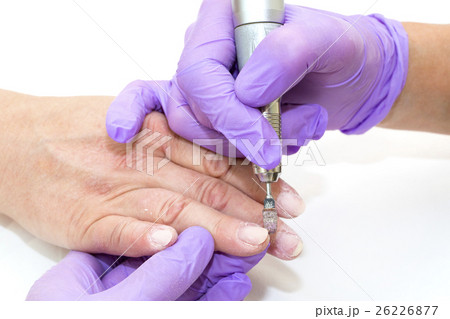 Woman doing manicure beauty salon varnish wellness 26226877