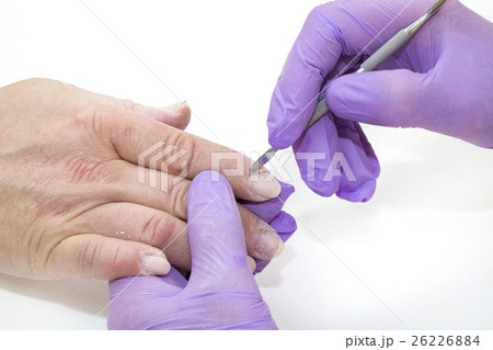 Woman doing manicure beauty salon varnish wellness 26226884