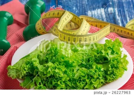 Fitness composition of lettuce, weights and ruler Fitness composition of lettuce, weights and ruler 26227963