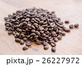 Handful lot of brown roasted coffee beans 26227972