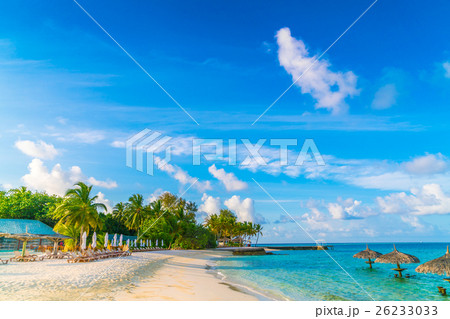 Beautiful tropical Maldives island with white sandy beach and sea . Beautiful tropical Maldives island with white sandy beach and sea . 26233033
