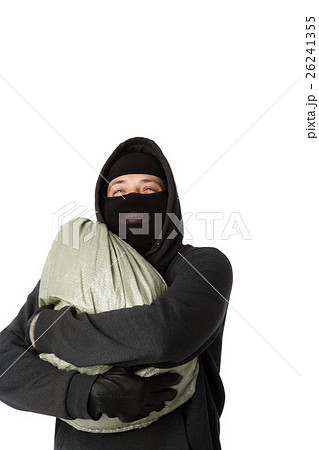 Robber holding bag of money Robber holding bag of money 26241355