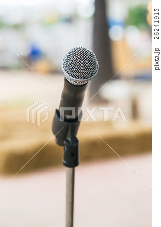 close up microphone in outdoor event. 26241915