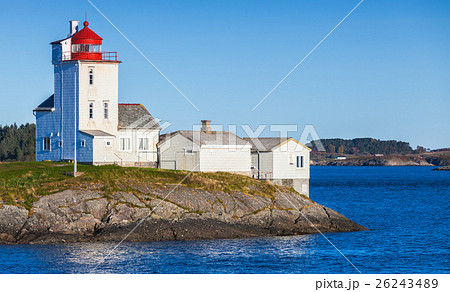 Lighthouse, white tower with red top. Norway Lighthouse, white tower with red top. Norway 26243489